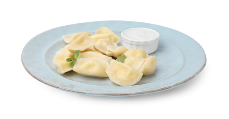 Plate of delicious dumplings (varenyky) with cottage cheese, mint and sour cream isolated on white