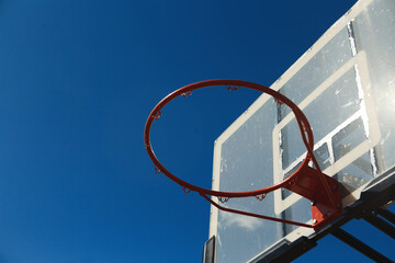 red basketball hoop on the sky background
