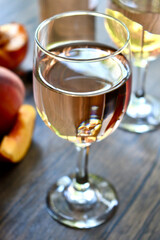 glass of peach wine
