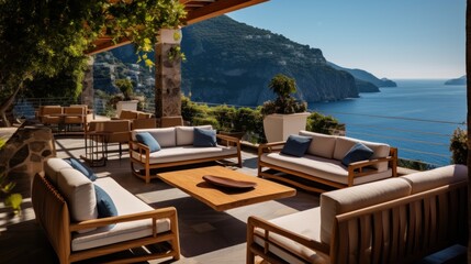 Obraz premium Luxurious villa nestled along the breathtaking Amalfi Coast of Italy, with panoramic views of the sparkling Mediterranean Sea and cliffside terraces