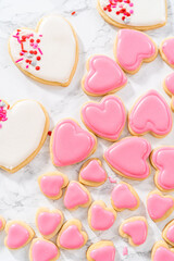 Heart-shaped sugar cookies with royal icing