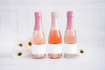 Mini champagne bottles with blank labels, 3.5x2" label mockup, bachelorette mockup, bridesmaids, wedding, party mockup