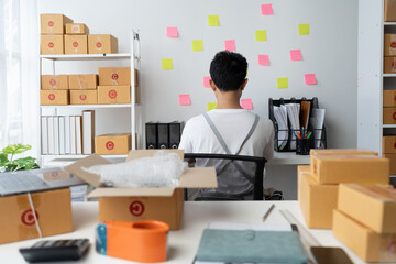 small business owner starting Asian freelance entrepreneur using PCs, laptops checking customer orders online at office. start business Entrepreneur Small Business SME Freelance Online Business