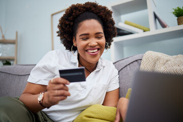 Happy black woman, laptop and credit card for online shopping, payment or banking on sofa at home. African female person or shopper smile with debit on computer app for ecommerce, purchase or buying - obrazy, fototapety, plakaty