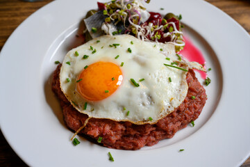 Seemanns Labskaus Hamburg Style Dish made from Salt Beef or Corned Beef with Potato, Onion, Beetroot, Pickled Herring and Fried Egg