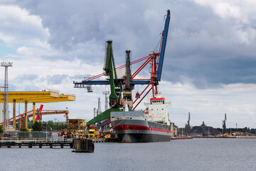 Poland, Gdansk, port of Gdansk, on the left the ship MERWEBORG (IMO: 9142552) is a...