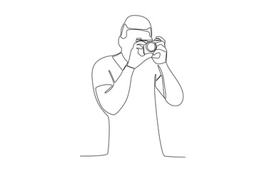One continuous line drawing of a male photographer taking photo from right side
