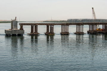 Fototapeta na wymiar Build of new Nile river Bridge after Luxor in direction Assuan during boat cruise construction site