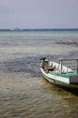 Naklejka premium boat on the beach