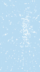 Magic falling snow christmas background. Subtle flying snow flakes and stars on light blue winter backdrop. Magic falling snow holiday scenery.   Vertical vector illustration.