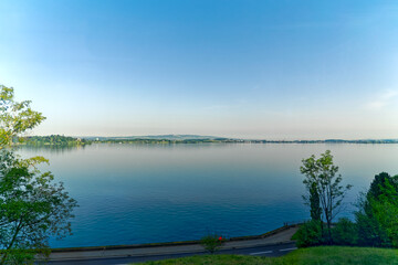 Scenic view of Swiss Lake Zug at Walchwil village on a sunny spring day. Photo taken May 22nd, 2023, Lake Zug, Switzerland.