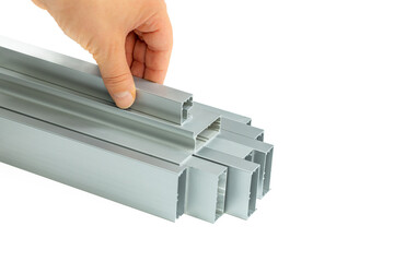 Aluminum profiles on a white background, copy space, used in the construction industry, interior...