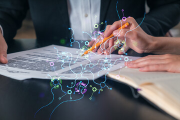 Businesspeople in formal wear taking notes signing contract at office workplace. Concept of important working moments, document sign, working process, concentration. Hands shot. Ai robotics hologram