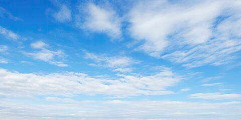 Naklejka na ściany i meble Summer sky. Blue and white cloudscape. Nature beauty. Abstract sky with clouds. Sunlight beautiful view