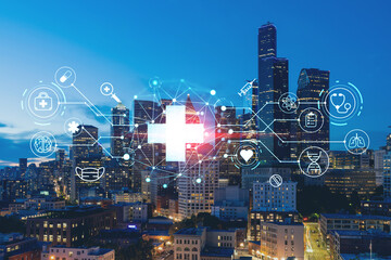 Illuminated aerial cityscape of Seattle, downtown at night time, Washington, USA. Health care digital medicine hologram. The concept of treatment and disease prevention