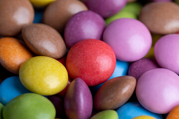 Fototapeta na wymiar Multicolored chocolates with chocolate filling