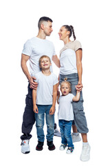 Fototapeta na wymiar Happy family with thinking children. Laughing man, woman, boy and girl embrace smiling. Love and tenderness. Full height. Isolated on a white background. Vertical.