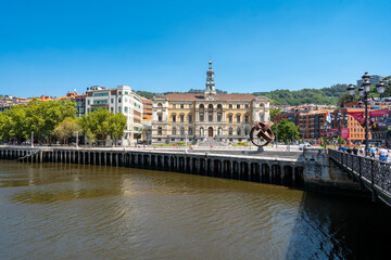 Beautiful City Hall building of the Bilbao city, built in Baroque style. In front of the building is the river Nervion. Travel destination in North of Spain
