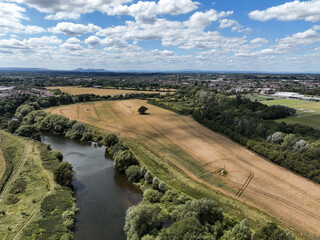 Fototapeta na wymiar Drone view of a river and fields in England on a summers day