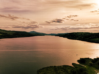 Shot of a long lake at sunset