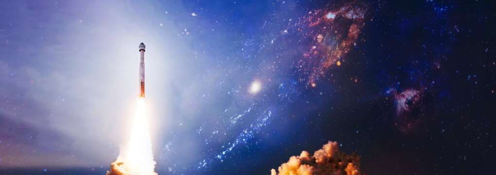 Dark space shuttle launch in the clouds with stars on background.Spaceship flight. Elements of this image furnished by NASA