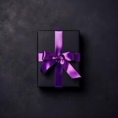 Top view at black gift box with purple ribbon