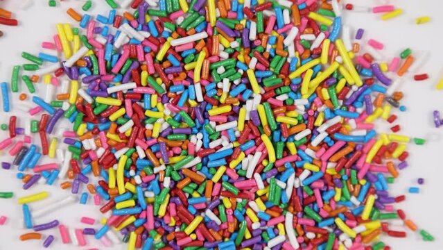 Shiny rainbow candy cake sprinkles