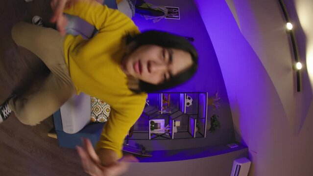 Multi-ethnic teenagers perform dance. Asian men perform fun energetic dance for videos for social media. Popular trending creative dance bloggers. Dance challenge for content makers, content creators