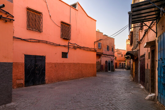 Marrakesh or Marrakech, Morocco. Early morning view of an alley inside the Medina. Traditional and colorful houses inside the old town.