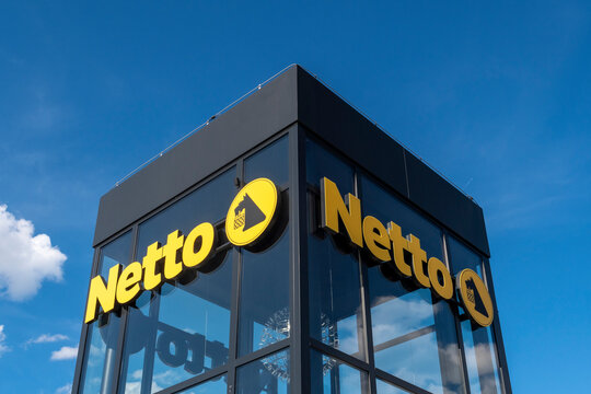 Warsaw, Poland - July 09, 2023: The sign and logo outside the Netto supermarket.