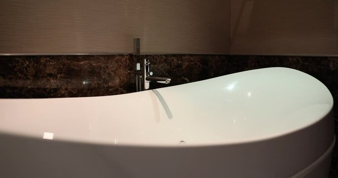 Beautiful comfortable sink with quality faucet in hotel closeup 4k movie slow motion. Sale of sanitary ware concept