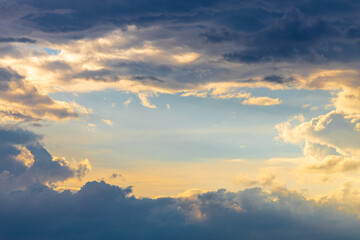 Fototapeta na wymiar beautiful stormy sky with the sun peeping through.