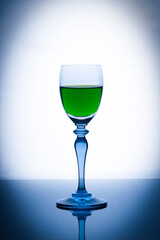 Glass of water, White background glass with green water