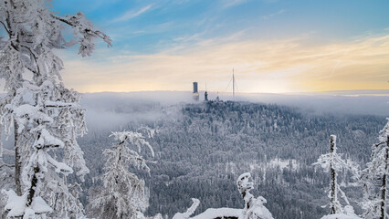 Winter landscape above the Taunus low mountain range with a view of the Großer Feldberg - Hesse,...
