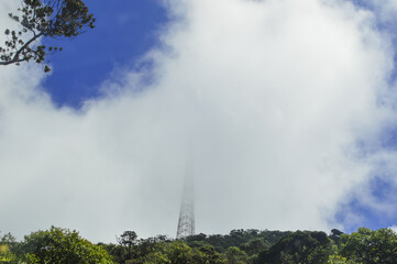 Fototapeta na wymiar Mount Pidurutalagala, a Symbol of Sri Lanka's Natural Beauty Cloud Touching
