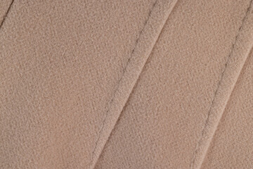 part of the fabric from beige-colored clothing