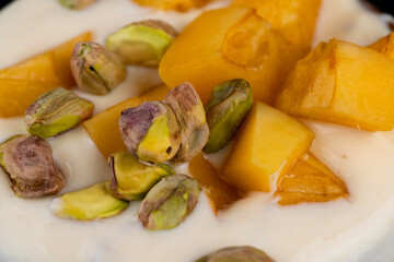 ripe yellow apricots on the table close-up