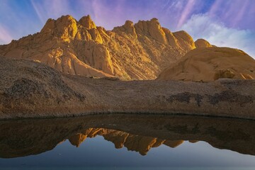 Fototapeta na wymiar Namibia, reflection of the mountains in the Namib desert