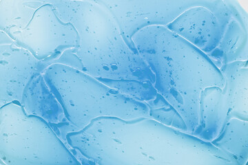 Clear gel serum texture. Liquid skincare cream background.