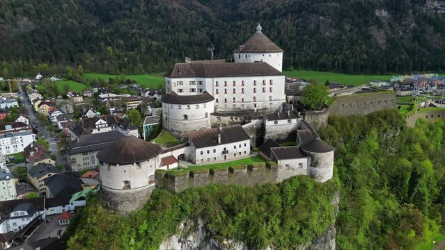 Aerial around view of Kufstein town with medieval Castle fortress in Tyrol, Austria, Alps mountains, 4k