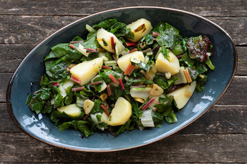 Blitva dish made with boiled potatoes, Swiss chard, garlic and olive oil. 