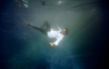 Man drowning in swimming pool