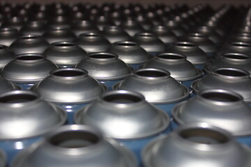 Empty cans in uk factory awaiting production into aerosols