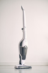 Contemporary vacuum cleaner placed on floor in apartment © ADDICTIVE STOCK CORE