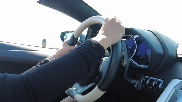 Hypercar Convertible Hypercar Supercar With Female Driving On Sunny Day Steering Wheel View