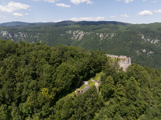 Fototapeta na wymiar Aerial view of the ruins of the Muran Castle above the village of Muran in Slovakia