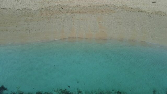 Beach with transparent turquoise ocean. Aerial view. Top view