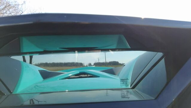 Back View Exotic Hypercar Driving With Another Supercar In Distance