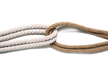 Bundled ropes on white background