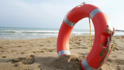 lifesaver on the beach near the shoreline, beach safety concept video